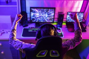 high angle gamer playing indoors